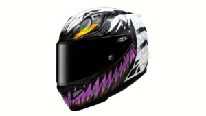 Capacete HJC RPHA 12N com grafismo Anti-Venom, exibindo o design simbiótico branco e agressivo com detalhes em preto e azul.