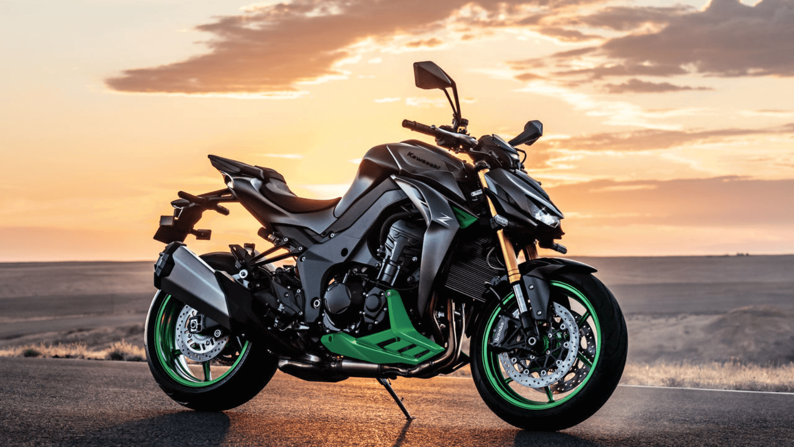 Linha 2027 de motocicletas Kawasaki exibindo suas novas opções de cores vibrantes e acabamentos sofisticados em um cenário moderno e dinâmico.