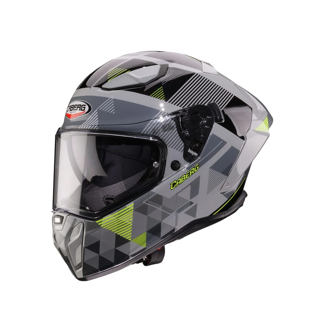 Capacete Caberg DRIFT EVO II 2026 com o novo grafismo PRISM em tons de cinza, preto e amarelo fluo, destacando seu design aerodinâmico e viseira solar DVT.