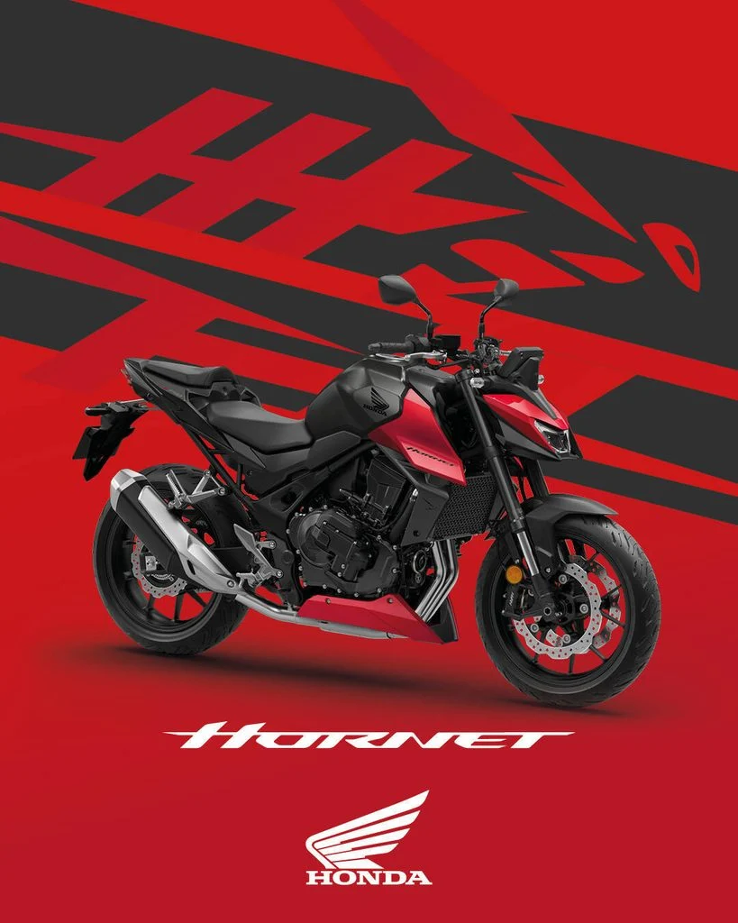 Honda CB750 Hornet 2027 com a nova combinação de cores Prata Mat Beta Metallic e Cinza Iridium Metallic, destacando seu design agressivo e farol duplo LED.