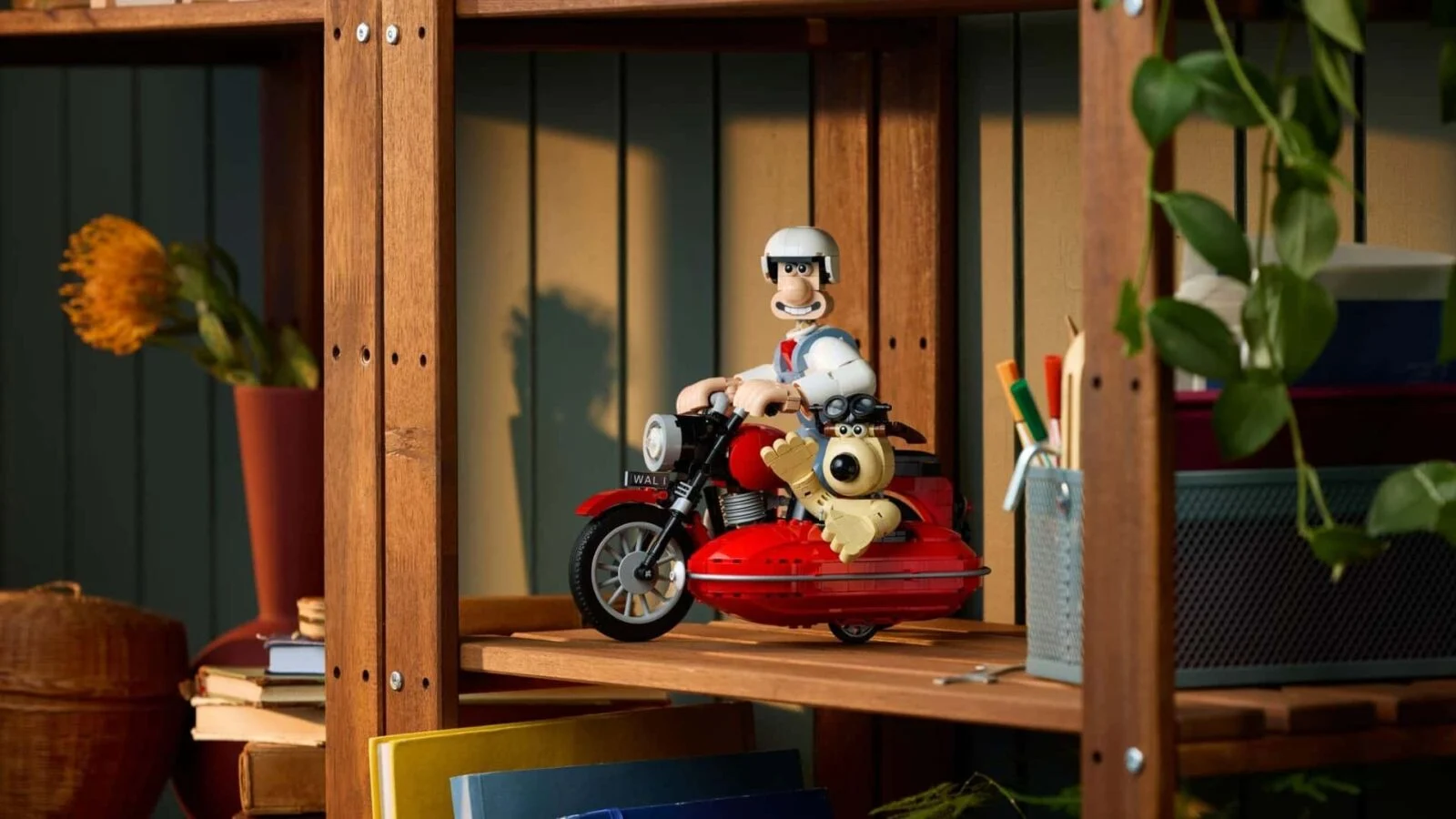 Renderização conceitual de um set LEGO da motocicleta com sidecar de Wallace e Gromit, mostrando os personagens em estilo LEGO e o veículo detalhado.