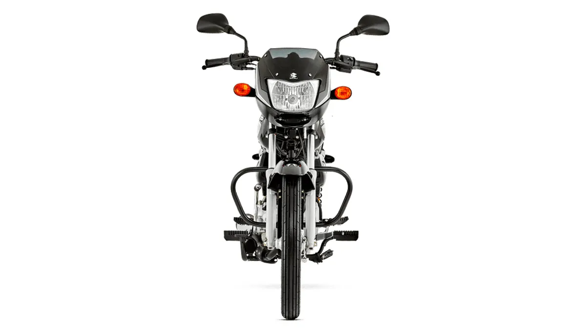 Motocicleta Bajaj Boxer em uso urbano na Colômbia, destacando seu design utilitário e robustez para o dia a dia.